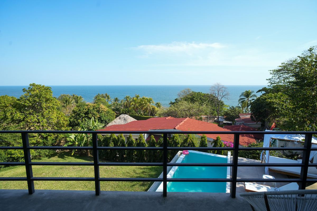Ocean view over the treetops from the balcony