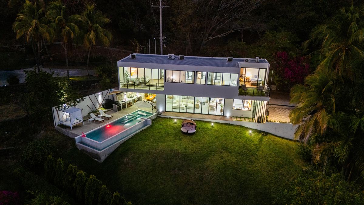 Aerial view of the villa at dusk